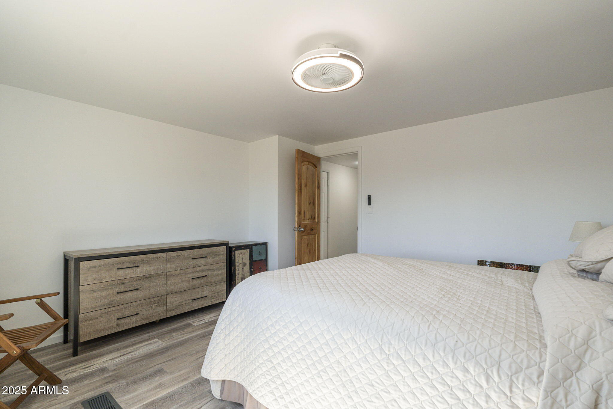 1373 East 23rd Avenue Apache Junction, AZ 85119 - Photo 39 of 53 a bedroom with a bed and a dresser