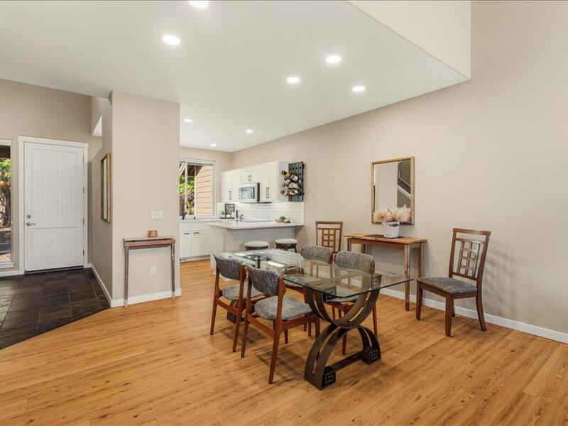 1378 Highland View Loop Redmond, OR 97756 - Photo 20 of 98 a view of a dining room with furniture and wooden floor
