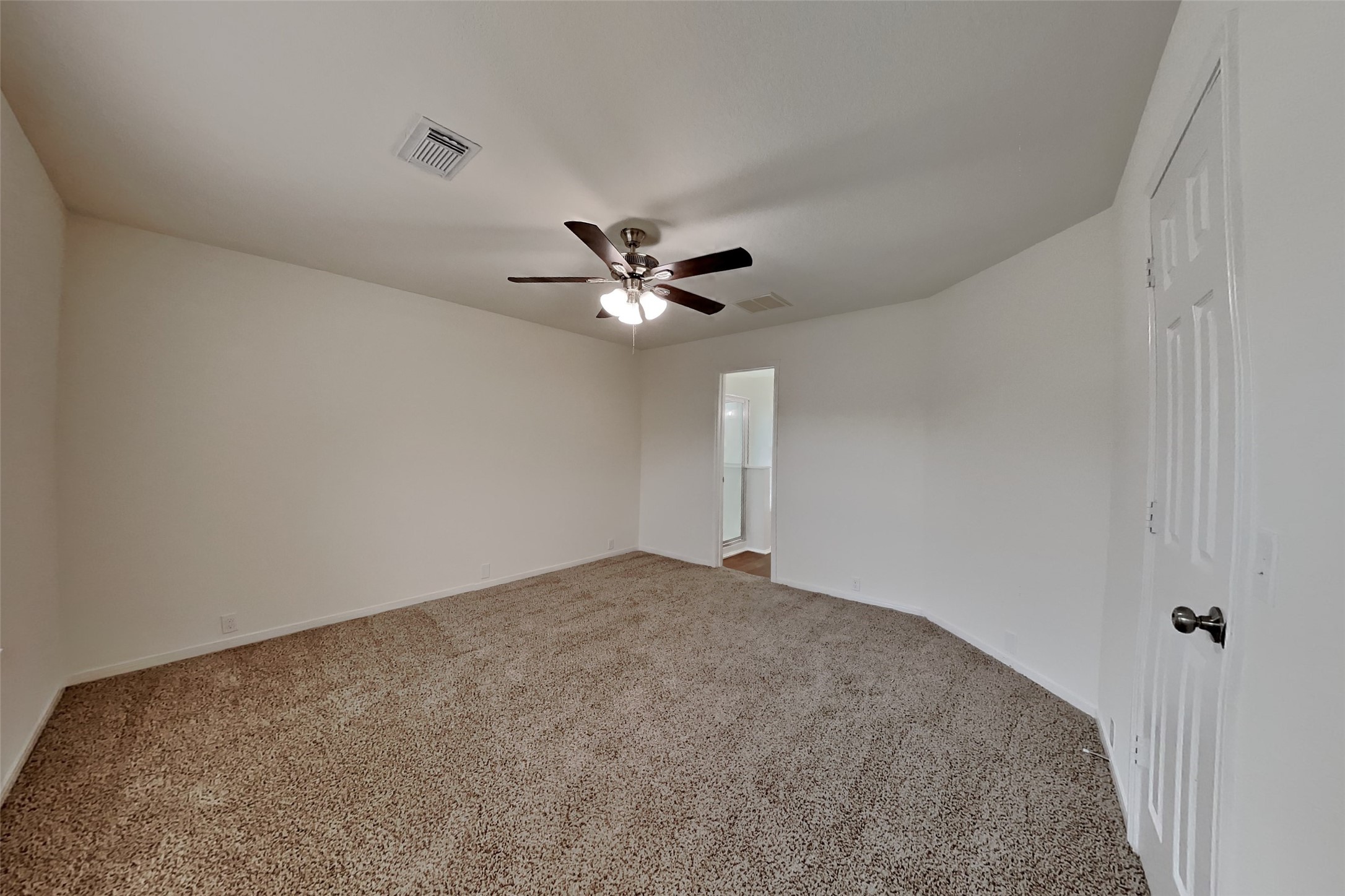 10414 Falling River Drive Houston, TX 77095 - Photo 6 of 18 a view of a livingroom with a ceiling fan and window