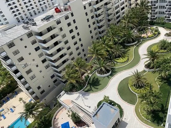 view of a swimming pool with outdoor seating