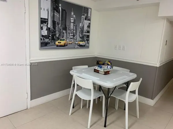 a view of a dining room with furniture and with chair