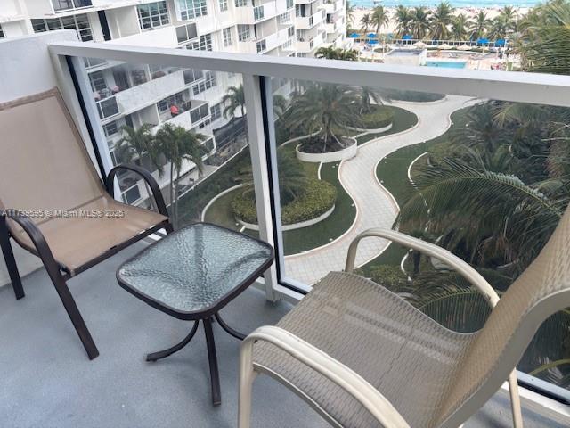 100 Lincoln Road, Unit 821 Miami Beach, FL 33139 - Photo 10 of 30 a view of a livingroom with furniture and a floor to ceiling window