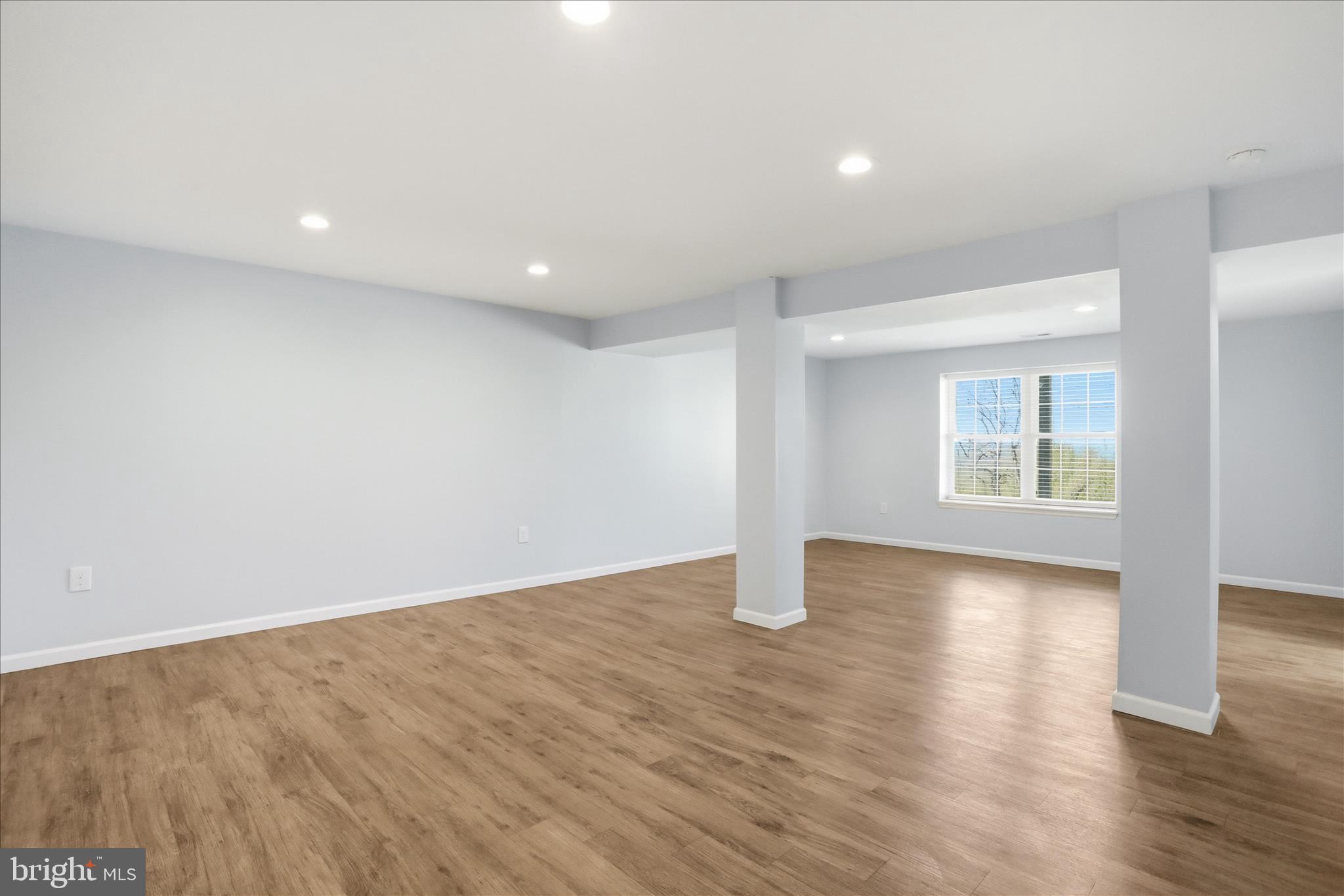 1033 Mountain Heights Road Front Royal, VA 22630 - Photo 25 of 44 a view of an empty room with wooden floor and a window