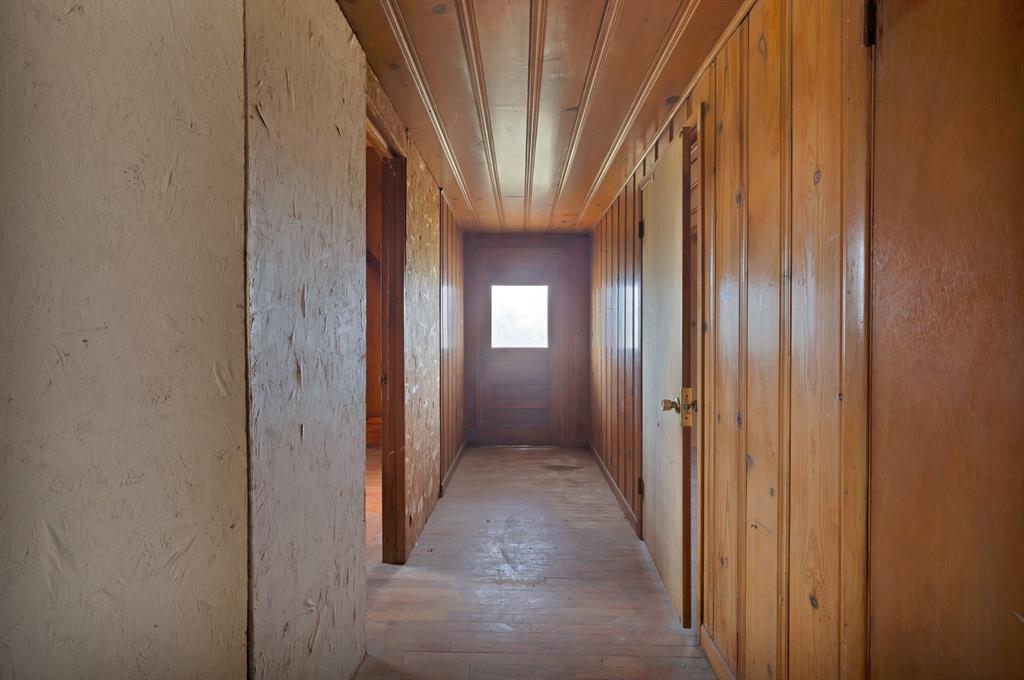 202 Johns Road Chico, TX 76431 - Photo 23 of 33 a view of hallway with stairs
