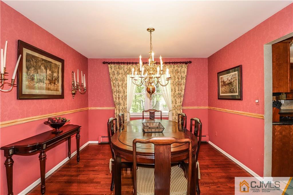 31 Sherwood Road Edison, NJ 08820 - Photo 7 of 25 a view of a dining room with furniture window and wooden floor