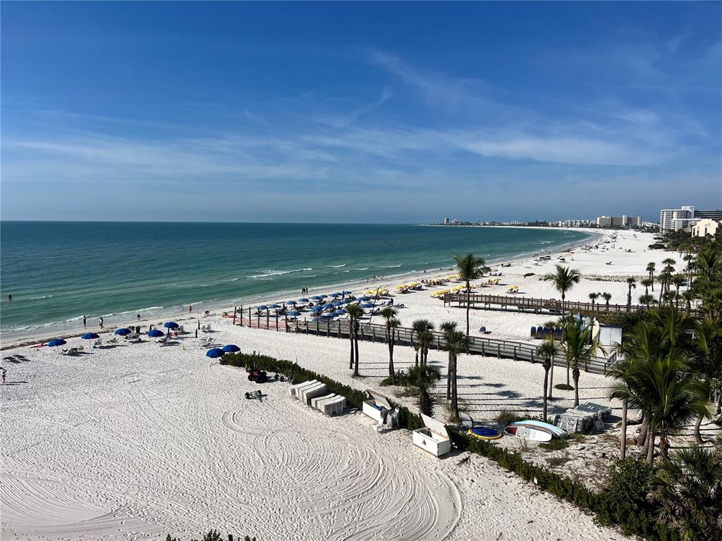 1001 Point Of Rocks Road, Unit 611 Sarasota, FL 34242 - Photo 20 of 39 a view of a balcony with chairs