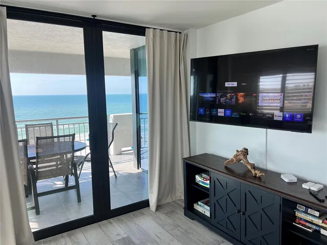 a view of a living room and window