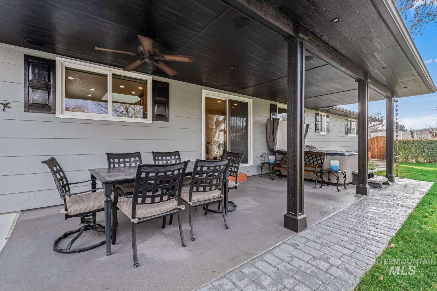 8720 Cornwall Drive Boise, ID 83704 - Photo 23 of 24 View of patio / terrace featuring outdoor dining space and a ceiling fan