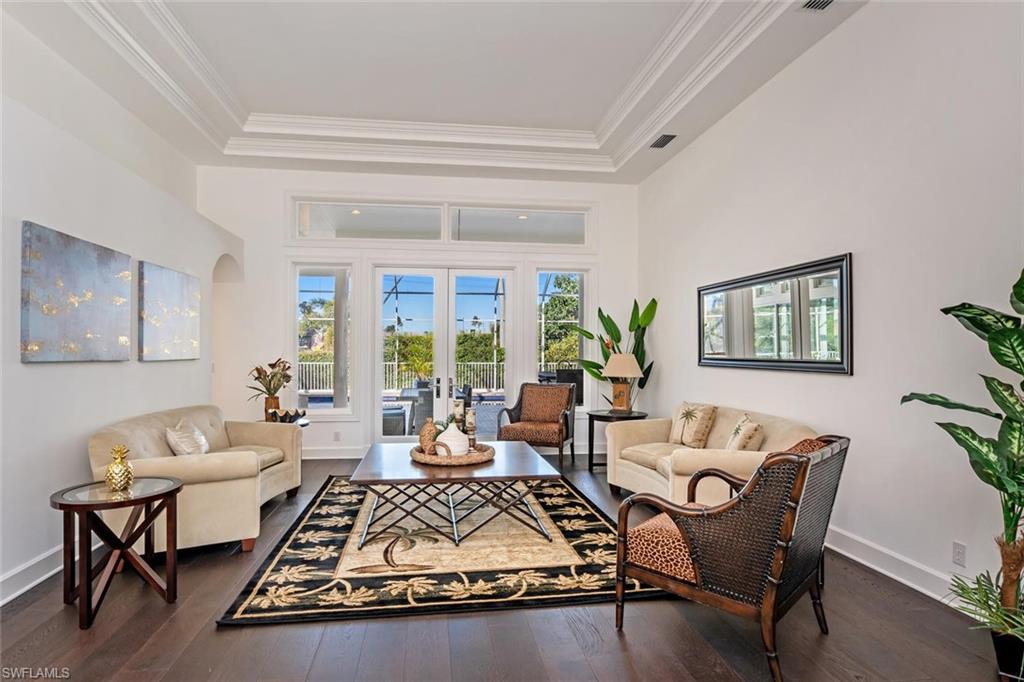 2540 Half Moon Walk Naples, FL 34102 - Photo 4 of 35 a living room with furniture rug and window