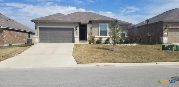 a view of a house with a patio