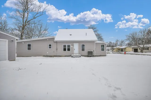a view of a house with a snow