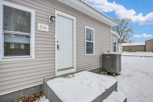 a view of a house with a patio