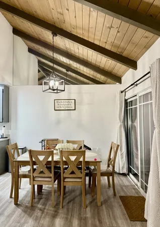 a view of a dining room with furniture
