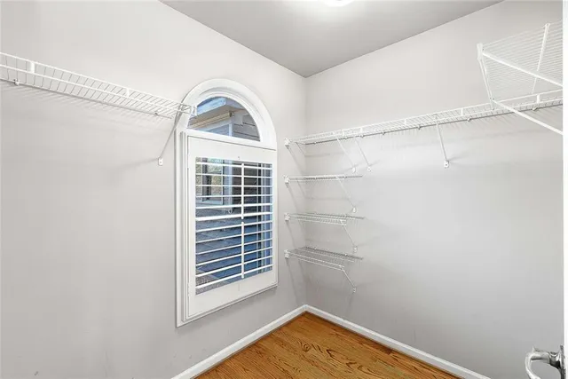 a bed room with a bed and a table