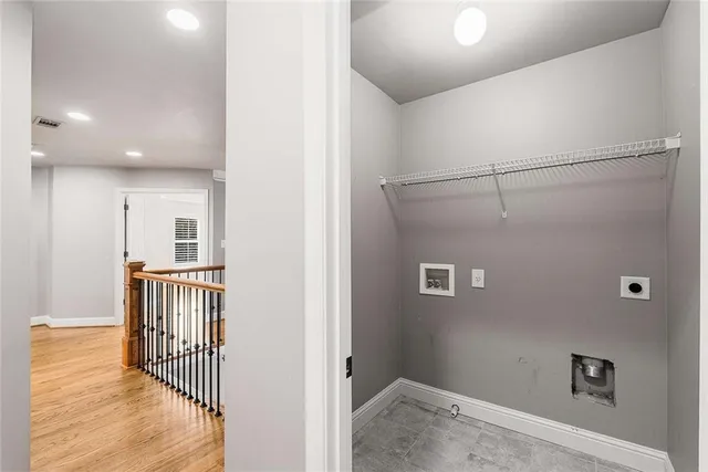 a view of entryway with wooden floor
