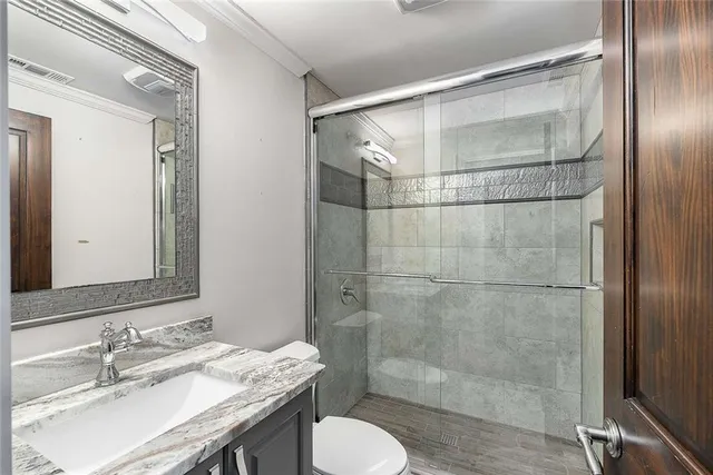 a view of balcony with wooden floor and fence