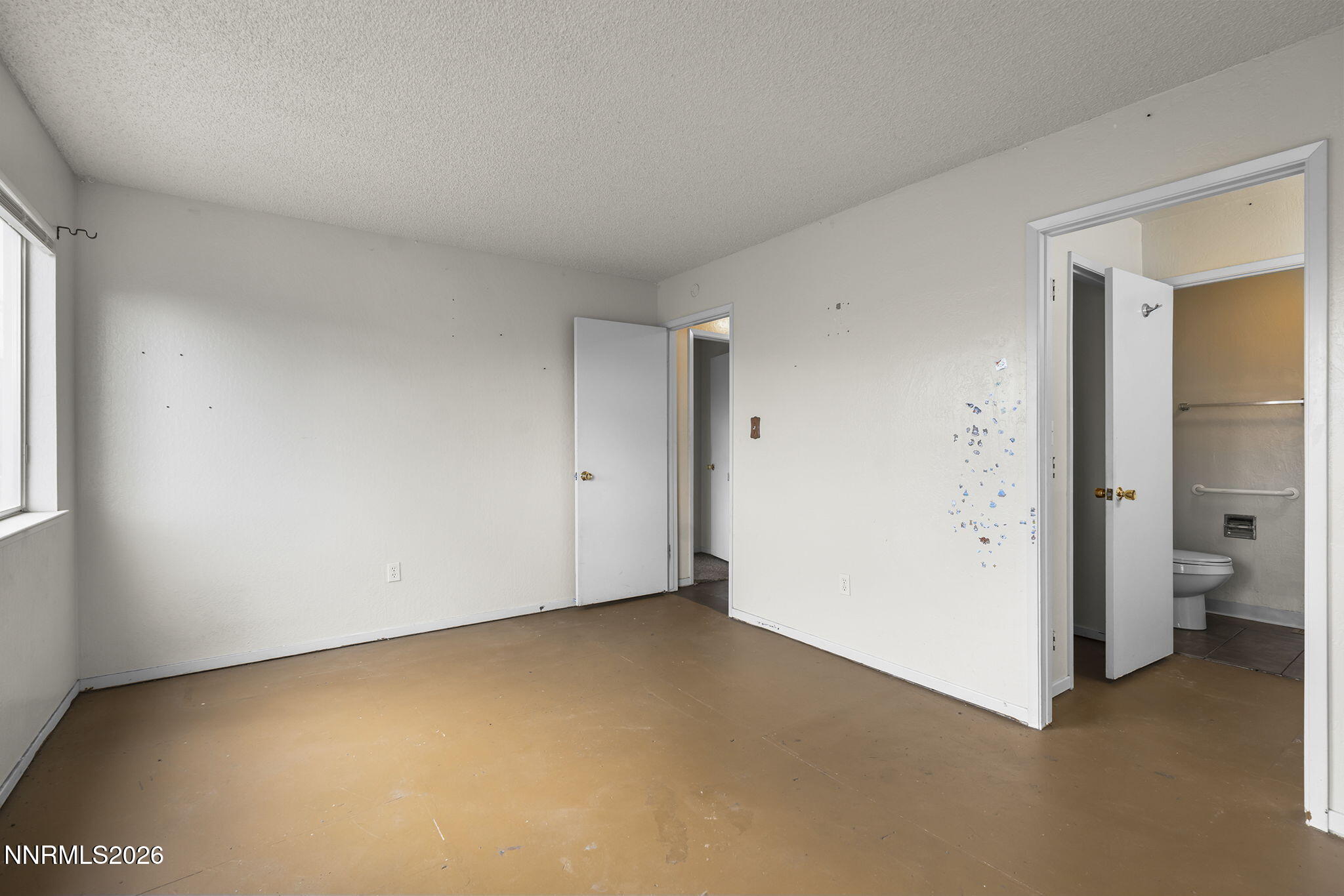 2550 Melody Lane Reno, NV 89512 - Photo 18 of 32 Primary Bedroom