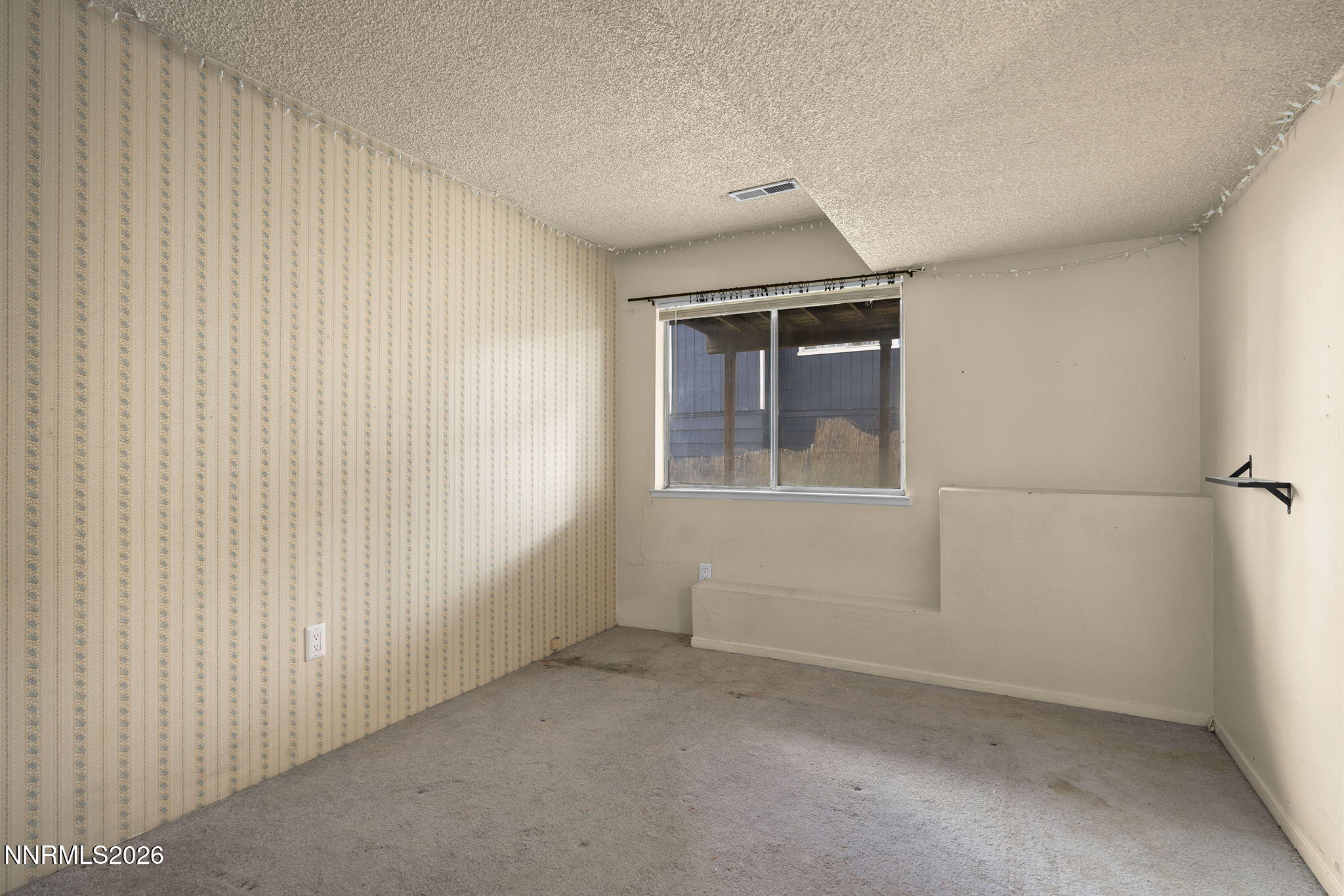 2550 Melody Lane Reno, NV 89512 - Photo 29 of 32 Basement Bedroom