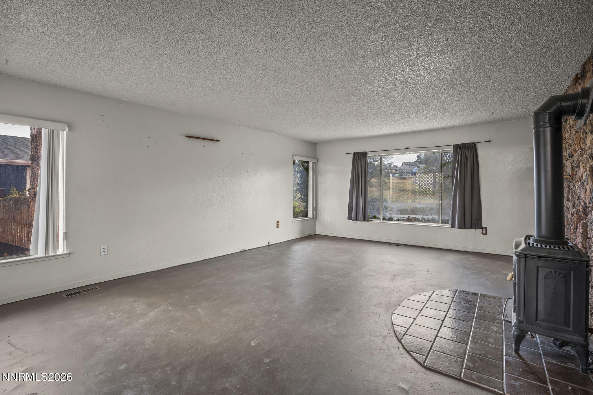 2550 Melody Lane Reno, NV 89512 - Photo 8 of 32 Main Level Living Room