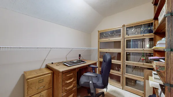 a view of a patio with couches and a fire pit