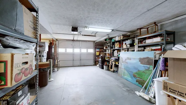 a view of a storage room with gym equipment