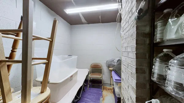 a view of a storage room with racks