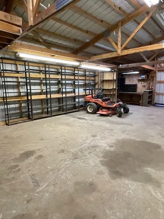 a view of a backyard of the house