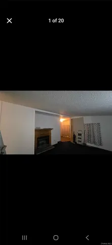 a kitchen with a car parked