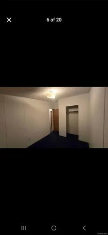 a kitchen with a sink and a microwave