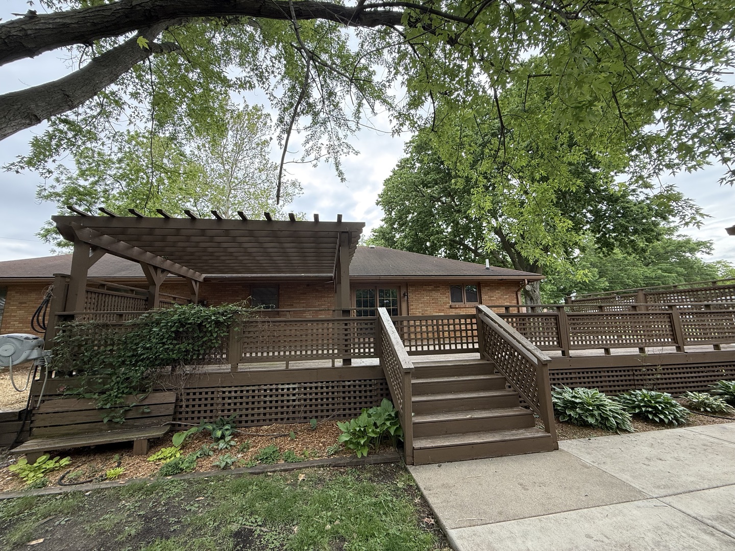1048 Warren Street Henry, IL 61537 - Photo 2 of 26 a view of a house with a yard