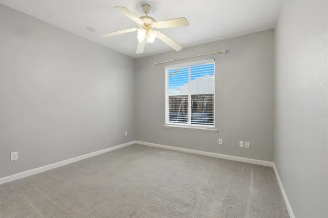 a bathroom with a granite countertop toilet a sink and bathtub