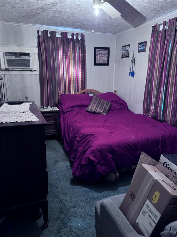 17134 Lake Ingram Road Winter Garden, FL 34787 - Photo 14 of 19 a bedroom with a bed and wooden floor