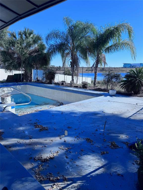 17134 Lake Ingram Road Winter Garden, FL 34787 - Photo 18 of 19 a view of a house with a yard