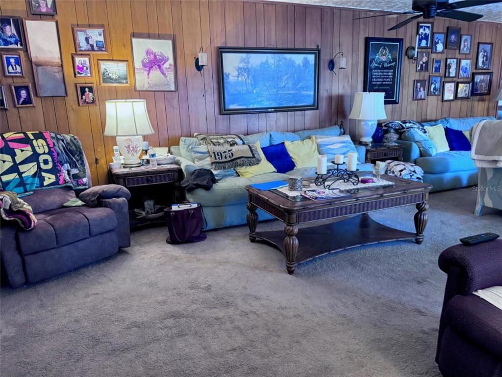 17134 Lake Ingram Road Winter Garden, FL 34787 - Photo 9 of 19 a living room with furniture and a couch