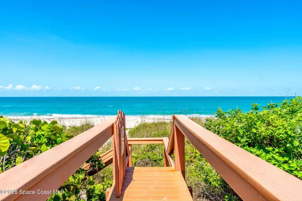 a view of ocean from a balcony