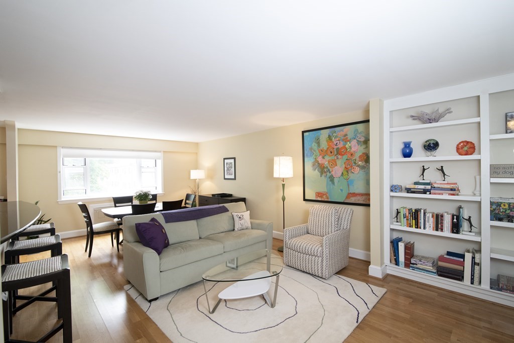 131 Sewall Avenue, Unit 37 Brookline, MA 02446 - Photo 1 of 27 a living room with furniture and a wooden floor