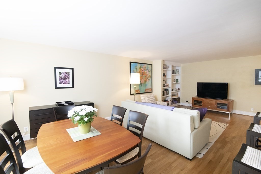 131 Sewall Avenue, Unit 37 Brookline, MA 02446 - Photo 14 of 27 a living room with furniture and a flat screen tv