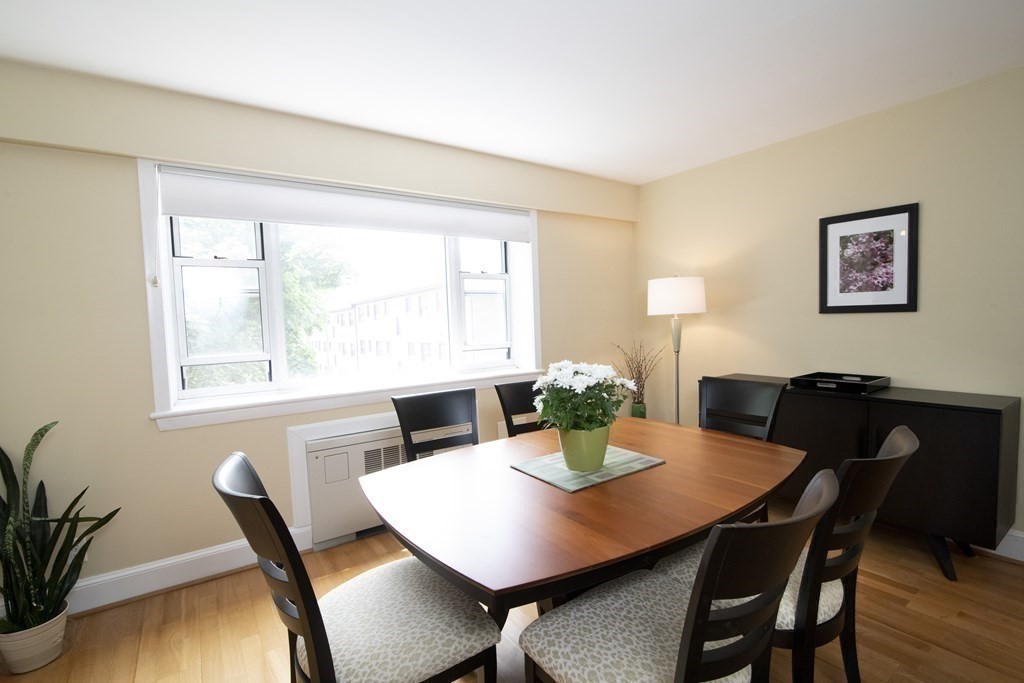 131 Sewall Avenue, Unit 37 Brookline, MA 02446 - Photo 15 of 27 a view of a dining room with furniture and window