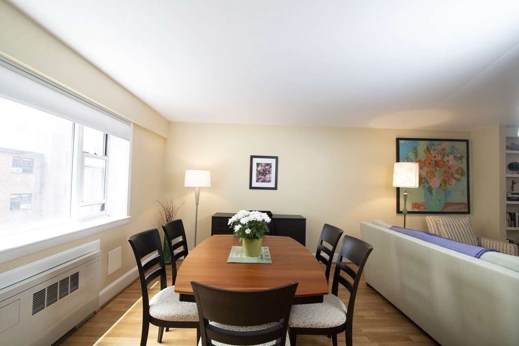 131 Sewall Avenue, Unit 37 Brookline, MA 02446 - Photo 16 of 27 a view of a dining room with furniture and a window