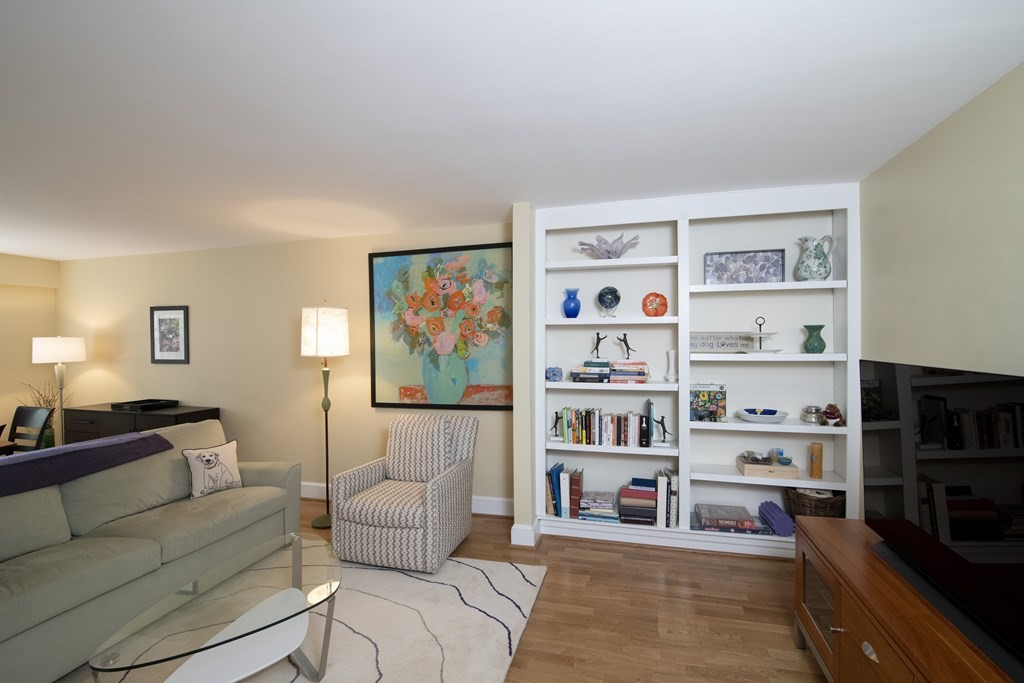 131 Sewall Avenue, Unit 37 Brookline, MA 02446 - Photo 2 of 27 a living room with furniture cabinets and a window