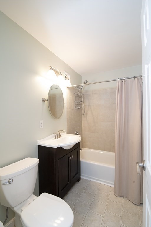 131 Sewall Avenue, Unit 37 Brookline, MA 02446 - Photo 22 of 27 a bathroom with a sink toilet and shower