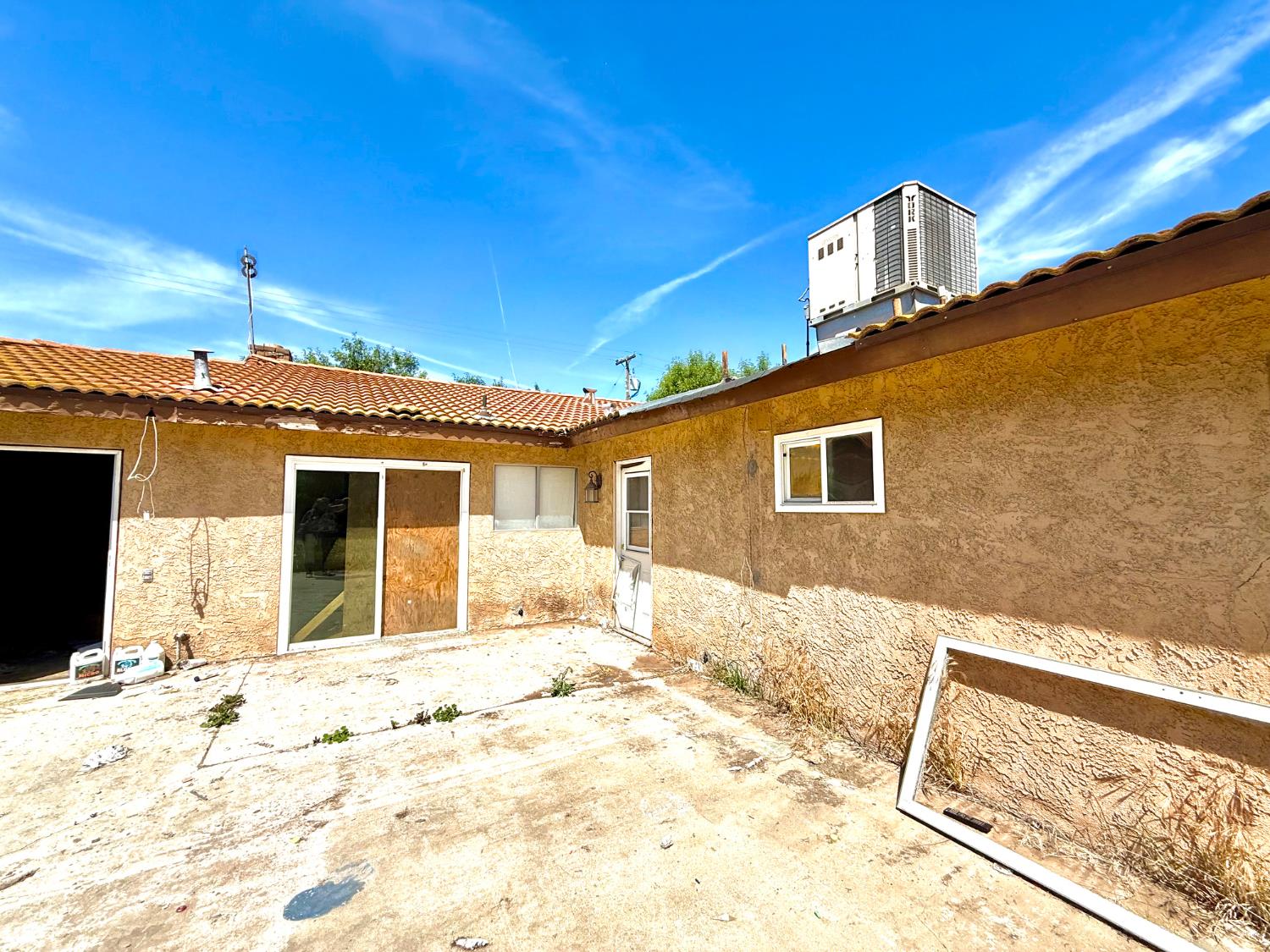 537 North Granada Drive Madera, CA 93637 - Photo 13 of 27 a front view of a house with a yard
