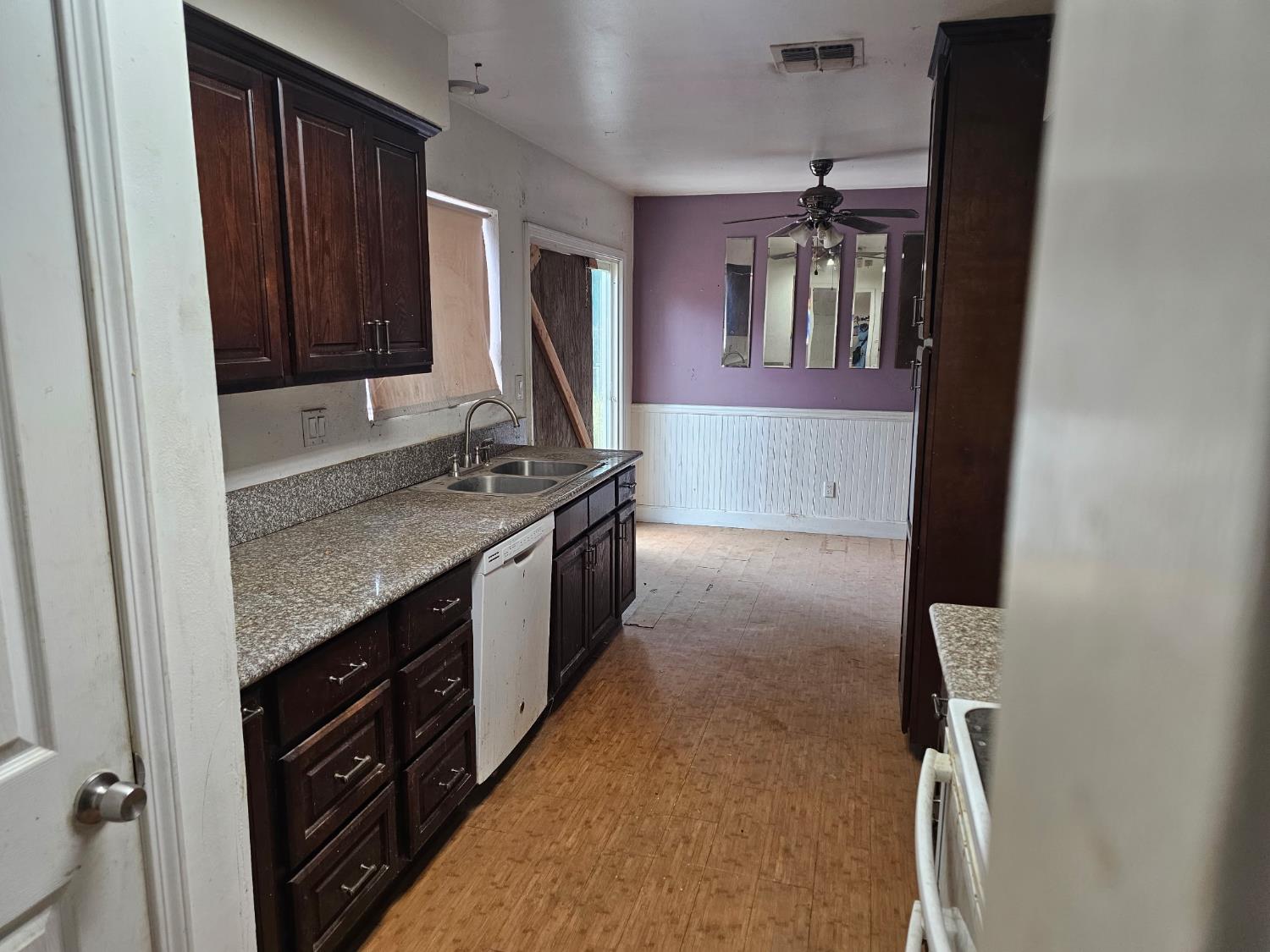 537 North Granada Drive Madera, CA 93637 - Photo 3 of 27 a bathroom with a granite countertop sink a vanity and mirror