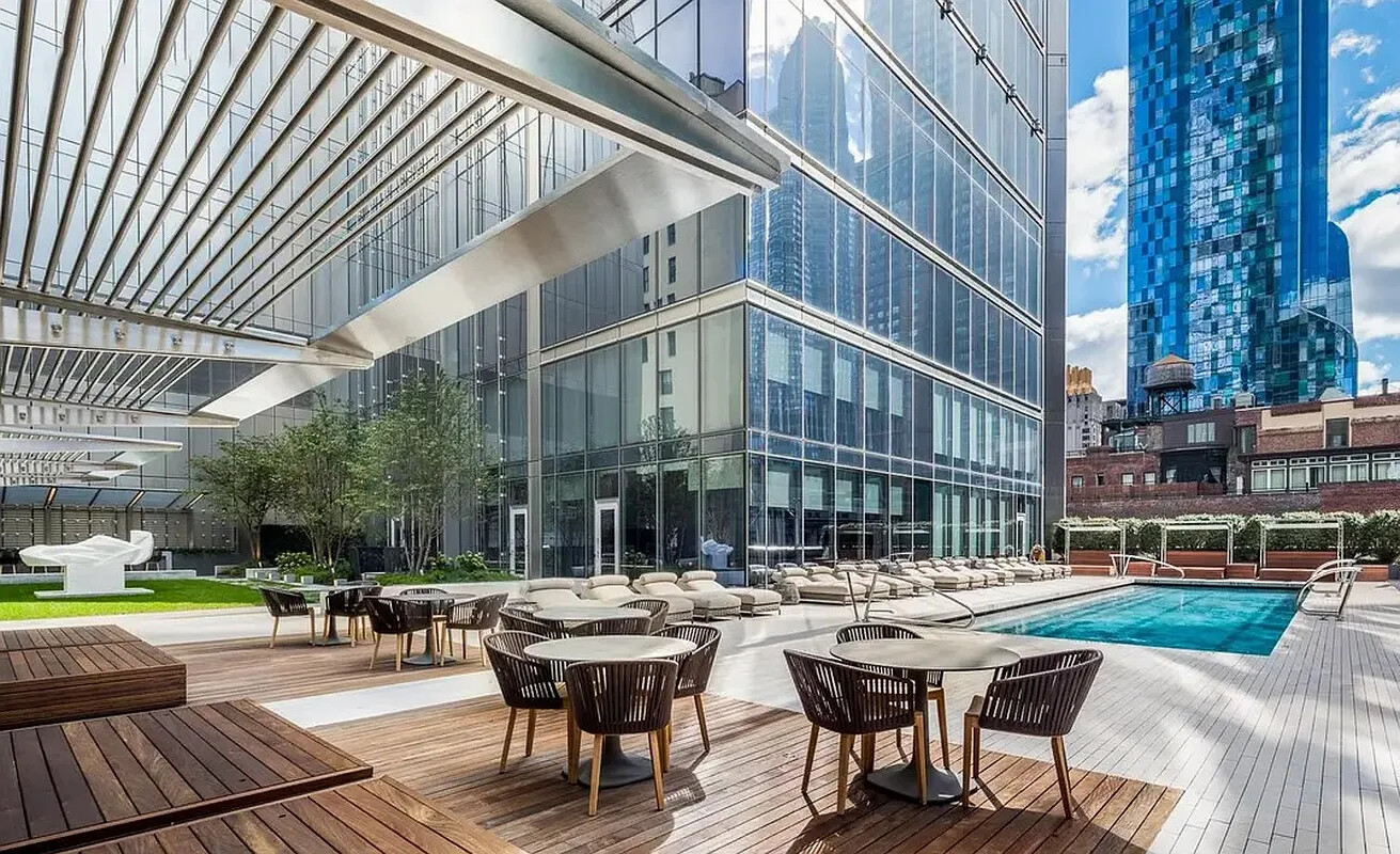 217 West 57th Street, Unit 43D Manhattan, NY 10019 - Photo 20 of 24 a view of a building with sitting area