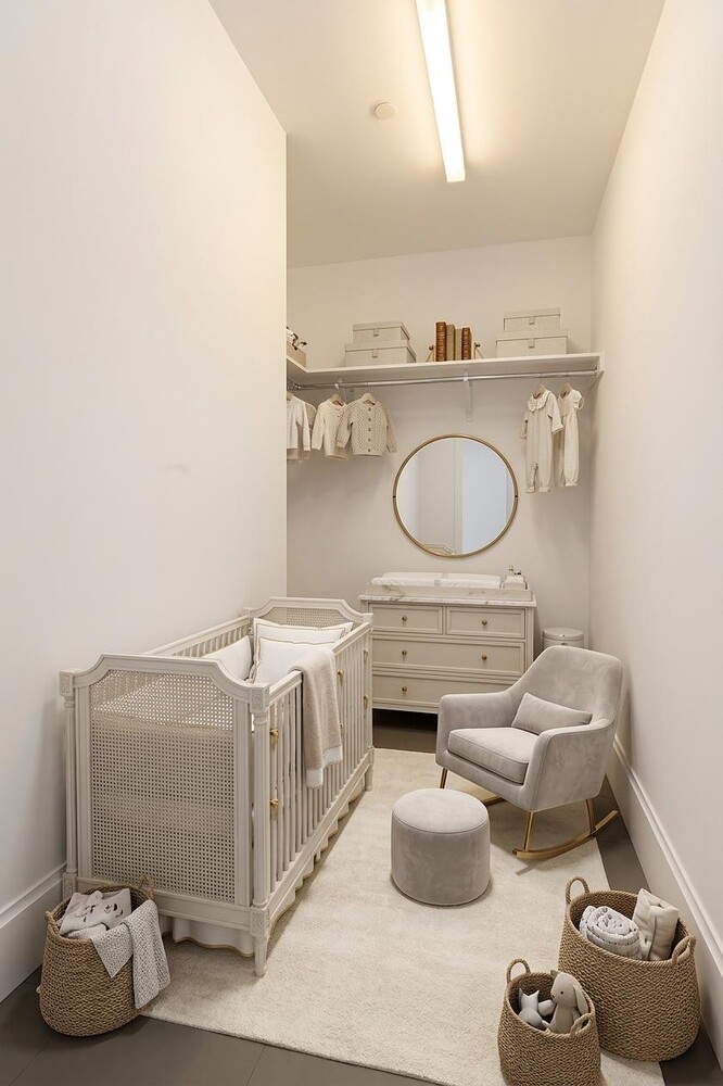 217 West 57th Street, Unit 43D Manhattan, NY 10019 - Photo 3 of 24 a bathroom with a sink mirror and toilet