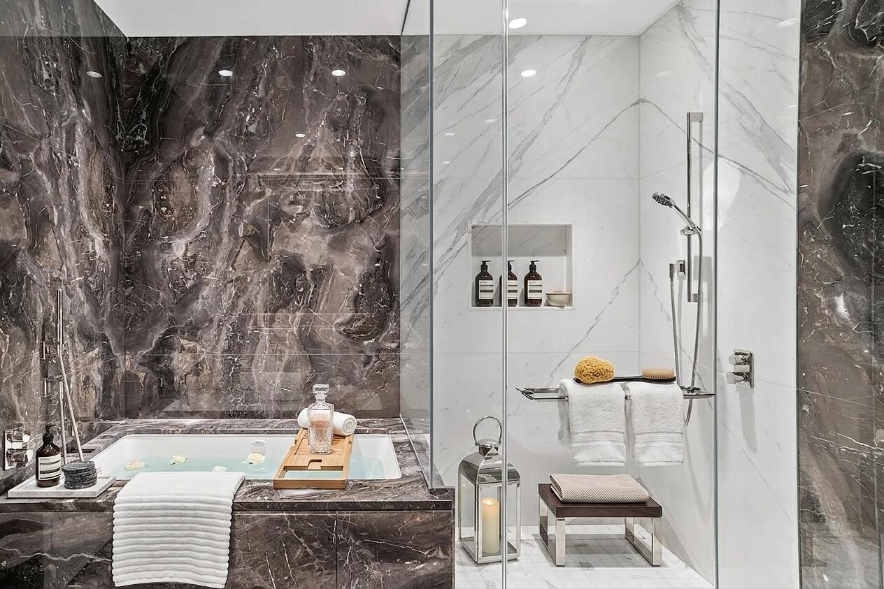 217 West 57th Street, Unit 43D Manhattan, NY 10019 - Photo 5 of 24 a bathroom with a shower