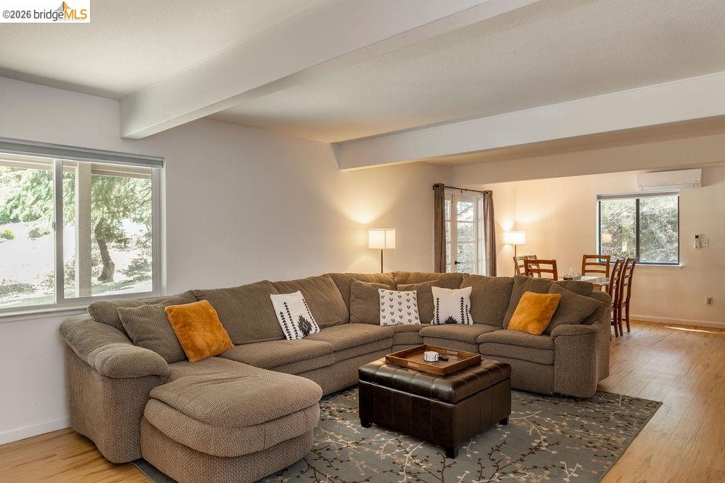 19266 Ferretti Road Groveland, CA 95321 - Photo 18 of 50 Living room with wood finished floors and beam ceiling