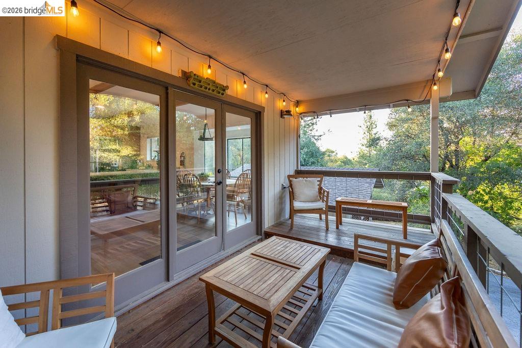 19266 Ferretti Road Groveland, CA 95321 - Photo 20 of 50 Balcony featuring french doors and an outdoor lounge area