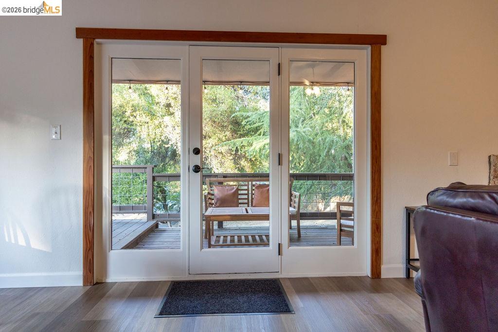 19266 Ferretti Road Groveland, CA 95321 - Photo 29 of 50 Doorway featuring plenty of natural light and wood finished floors