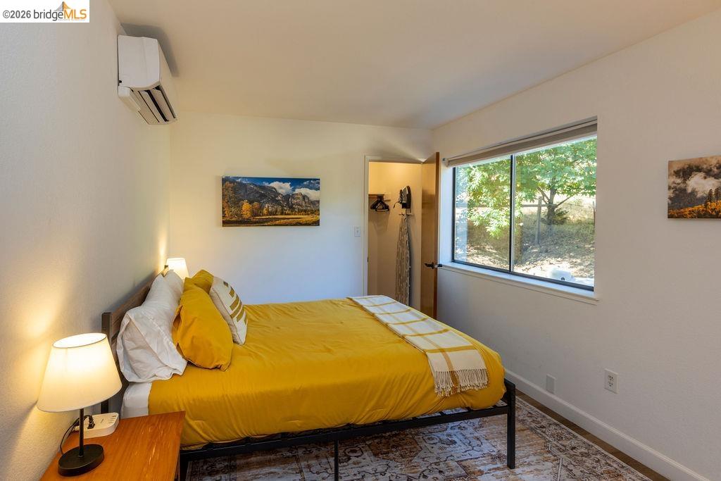 19266 Ferretti Road Groveland, CA 95321 - Photo 10 of 50 Bedroom featuring a mini split for heating / cooling and baseboards